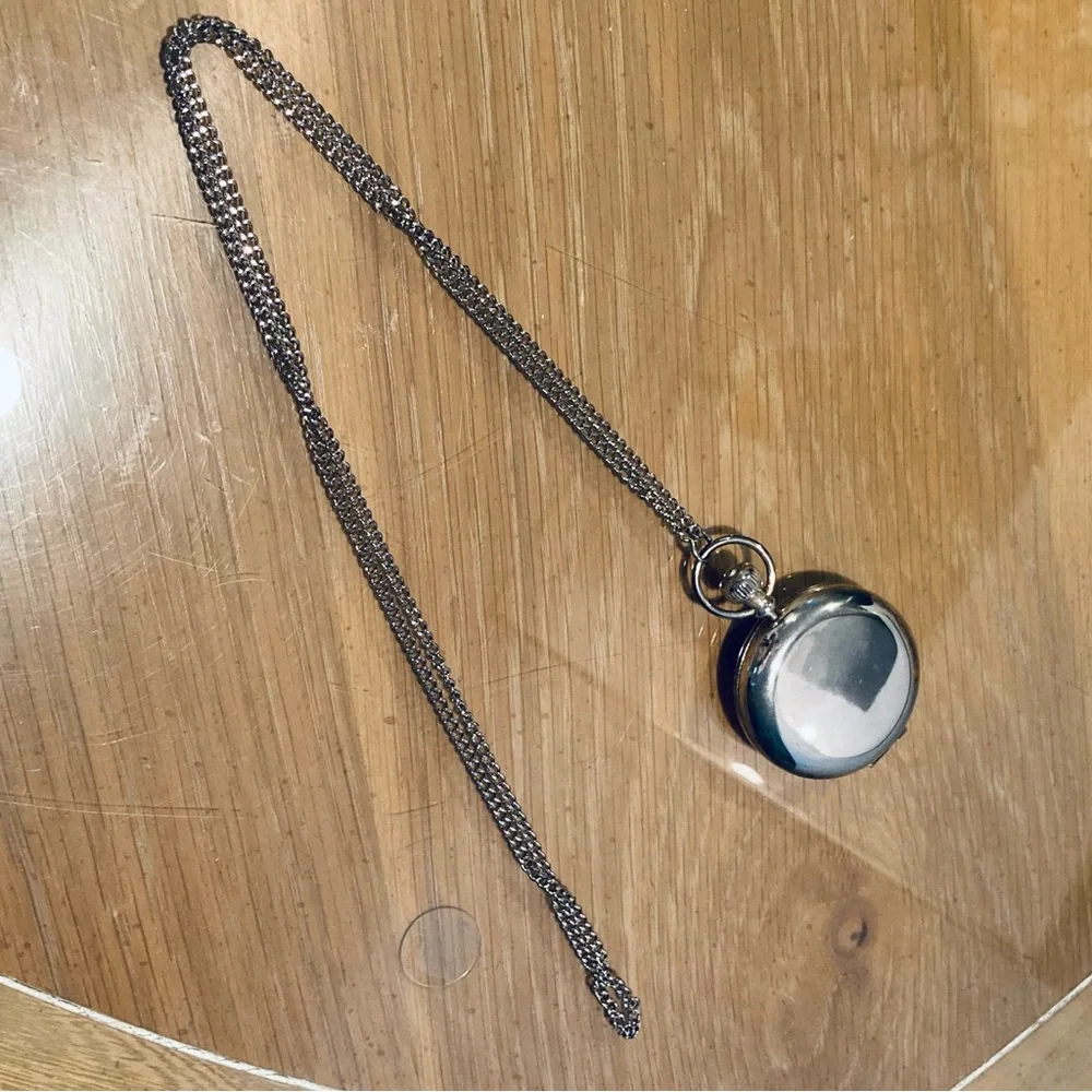 Estee Lauder pocket watch